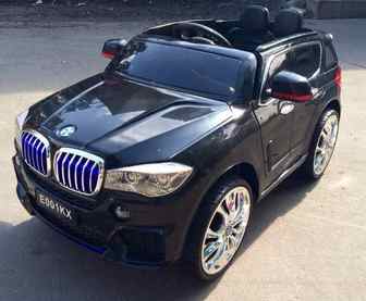 Детский джип BMW X5 E001КХ на резиновых колесах.